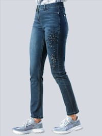 Jeans met opvallende borduursels