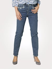 Jeans with embellished pockets