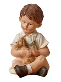 Figurine garçon et chien