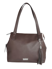 Handbag with a decorative tassel