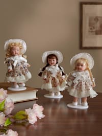 Lot de 3 poupées en porcelaine