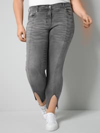 Jeans mit streckendem Schlitz am Saum