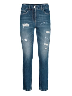 Jeans med slitte detaljer