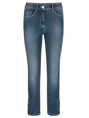 Jeans mit Glitzersteinchenapplikation am Saumabschluss