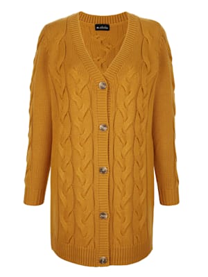 Dlhý sveter s výrazným vrkočovým pleteným vzorom