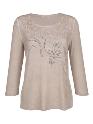 Top with chic lace detailing