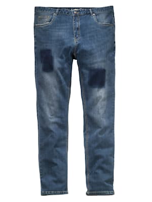 Jeans med avsiktligt slitna effekter