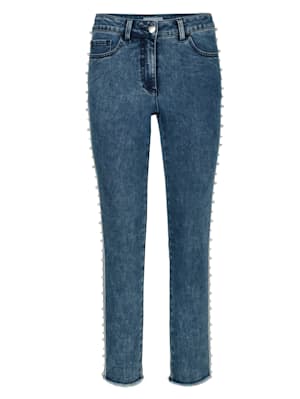 Jeans med fransiga benslut