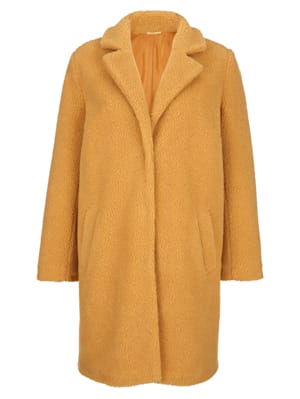 Kožušinový kabát v modernom tvare