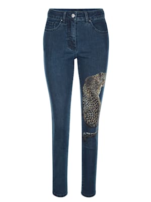 Jeans med leopardmotiv på benet