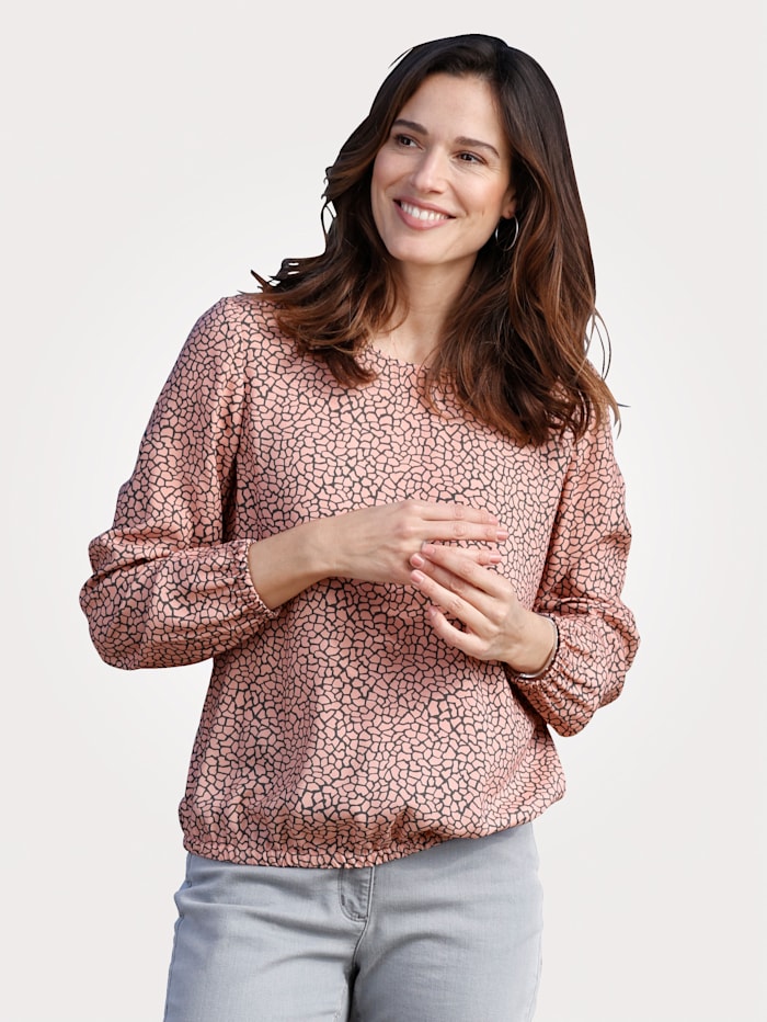Pull-on blouse made from a soft fabric